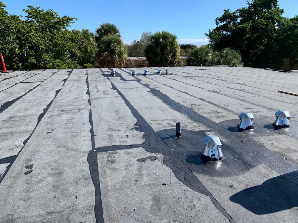 Slide of JVV Roofing