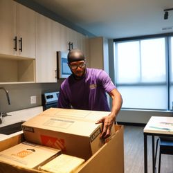 2 College Brothers Moving and Storage - Gainesville - Movers in the home, putting on a smile