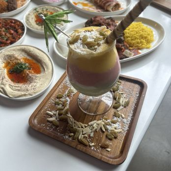 Turkish Village - Mango strawberry and avocado drink topped with raisins - Salad Near Me - Dearborn, Michigan Turkish Village - Mango strawberry and avocado drink topped with raisins - Salad Near Me - Dearborn, Michigan