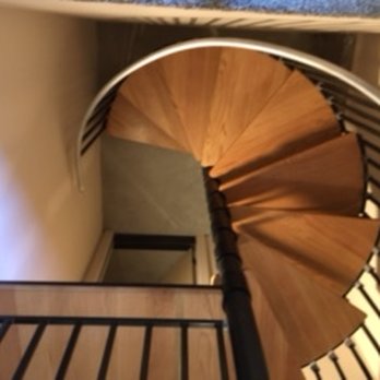 Crestview Builders - a spiral staircase in a home - General Contractors Near Me - Crestline, California