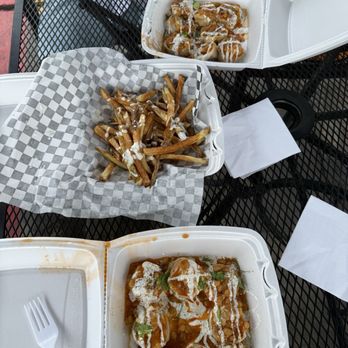 Mealma Meena Dumplings N more - Chicken dumplings at the bottom, french fries, and beef dumplings at the top. Yummy! - Food Trucks Near Me - Pflugerville, Texas