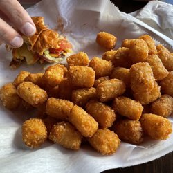 10 out of 10 for a singe patty flat top grill bar food cheeseburger with perfectly done tater tots