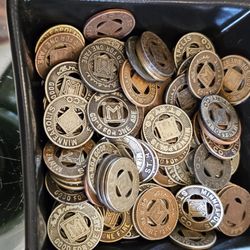 Minnesota Streetcar Museum - These are the token you use for a ride.  They were salvaged from the original streetcars and then used on city buses.