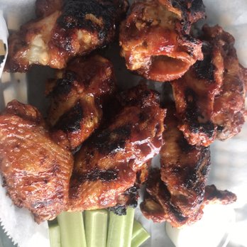 Pirana Grille - chicken wings and celery - Sports Bars Near Me - Ormond Beach, Florida