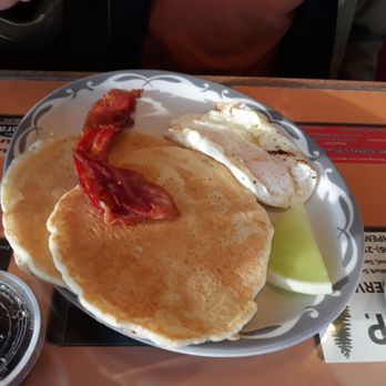 Jeffrey's Restaurant - a plate of pancakes with bacon and eggs - Breakfast & Brunch Near Me - Marquette, Michigan