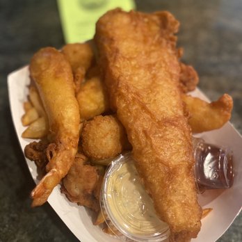 Tracy Harbour Fish & Chips - #12 the sampler (1 fish, 3 prawns, 3 oysters, 2 scallops with fries) - Fish & Chips Near Me - Tracy, California Tracy Harbour Fish & Chips - #12 the sampler (1 fish, 3 prawns, 3 oysters, 2 scallops with fries) - Fish & Chips Near Me - Tracy, California