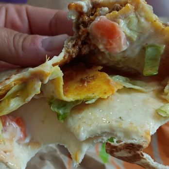 Taco Bell - Inside my crunchwrap. Seriously lacking filling - Fast Food Near Me - Sacramento, California