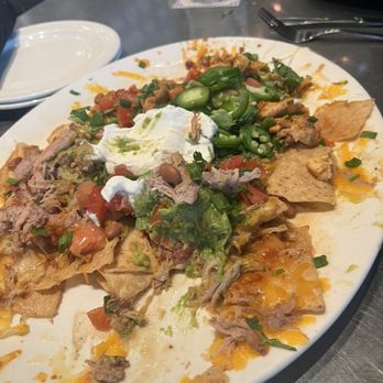 Yard House - Half chicken half carnitas nachos. Biggest plate on menu - Bars Near Me - Pasadena, California Yard House - Half chicken half carnitas nachos. Biggest plate on menu - Bars Near Me - Pasadena, California