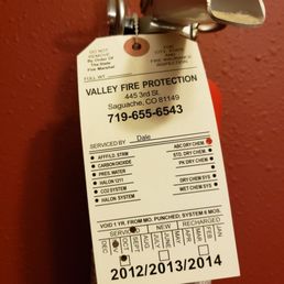 Expired fire extinguishers in room. Expired fire extinguishers in room.