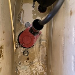 Inside of toilet tank Inside of toilet tank