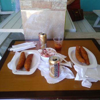 Donde Olga - First stop when arriving in Puerto Rico in Pinones Donge Olga ice Cold medalla alcapurrias the ensalada de pulpo. The Best!!! - Caribbean Near Me - Loíza, Puerto Rico
