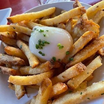 Salty Sow - Yes, that's an egg in the fries. Really yummy! - American Near Me - Austin, Texas