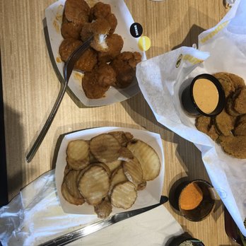 Buffalo Wild Wings - a variety of food items on a table - American Near Me - Norfolk, Nebraska