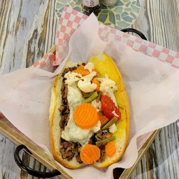 Dynamite grill - a hot dog with various toppings - Burgers Near Me - Arlington, Texas Dynamite grill - a hot dog with various toppings - Burgers Near Me - Arlington, Texas