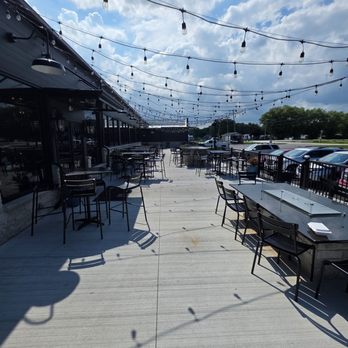 Wild Wings Restaurant & Lounge - Outside sitting area for restaurant in the rear of the building. - American Near Me - Oak Harbor, Ohio Wild Wings Restaurant & Lounge - Outside sitting area for restaurant in the rear of the building. - American Near Me - Oak Harbor, Ohio