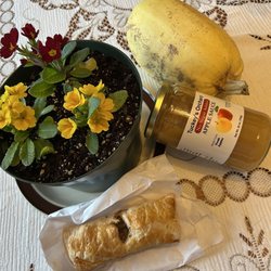 Gaithersburg Main Street Pavilion Farmers Market - Tuckey's applesauce, spaghetti squash, lamb phyllo pocket, and primroses.