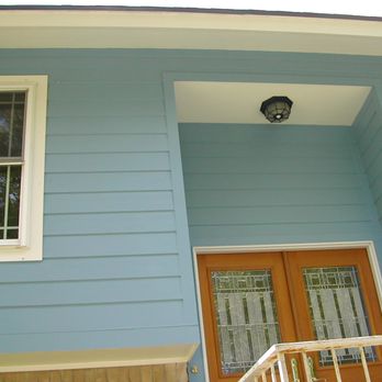 Gulf Coast Renovations - a blue house with a light fixture - General Contractors Near Me - Bacliff, Texas Gulf Coast Renovations - a blue house with a light fixture - General Contractors Near Me - Bacliff, Texas