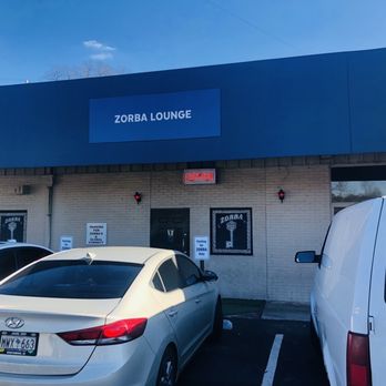 Zorba Lounge - a car parked in a parking lot - Lounges Near Me - Greenville, South Carolina Zorba Lounge - a car parked in a parking lot - Lounges Near Me - Greenville, South Carolina