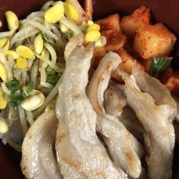 Pork jowl with bean sprout and kimchi radish over rice