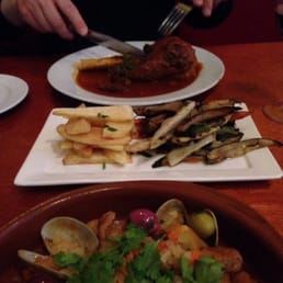 Carne de porco con ameijoas and a lamb shank. Carne de porco con ameijoas and a lamb shank.