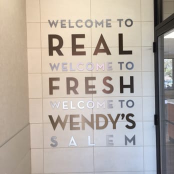 Wendy's - a welcome sign on a wall - Fast Food Near Me - Salem, New Hampshire