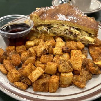 Egg & I - Half stuffed French toast with seasoned taters - Breakfast & Brunch Near Me - Las Vegas, Nevada