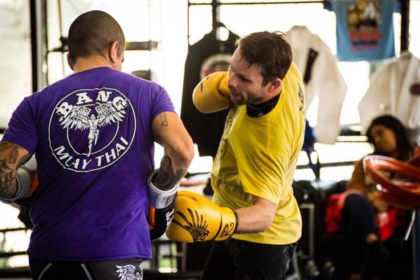 BANG Muay Thai Classes - Bas Rutten Inspired - Learn the best standing self-defense skills in our Muay Thai Classes right here in Dripping Springs! Looking for the best combination of stand-up striking and total-body fitness? Well, at Meta Martial Arts, our Muay Thai Kickboxing classes have you covered. Bas Rutten Inspired BANG Muay Thai Kickboxing is a Dutch based striking system that has been proven to be successful inside the Cage and Ring!
We're offering the Art of Eight Limbs to men and women all across Dripping Springs, helping you take on total-body strength, balance, and coordination. This class is great for all experience levels. BANG Muay Thai Classes - Bas Rutten Inspired - Learn the best standing self-defense skills in our Muay Thai Classes right here in Dripping Springs! Looking for the best combination of stand-up striking and total-body fitness? Well, at Meta Martial Arts, our Muay Thai Kickboxing classes have you covered. Bas Rutten Inspired BANG Muay Thai Kickboxing is a Dutch based striking system that has been proven to be successful inside the Cage and Ring!
We're offering the Art of Eight Limbs to men and women all across Dripping Springs, helping you take on total-body strength, balance, and coordination. This class is great for all experience levels.