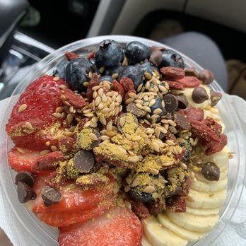 Juice n' Bowls - 12 oz build-your-own. Carob chips, bee pollen, flax seeds, goji berries on top of fruit, granola, almond butter, acai sorbet. - Juice Bars & Smoothies Near Me - Glendora, California