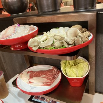 Pipa Mountain Hot Pot - Sliced fish, mushroom platter, Napa cabbage, ribeye beef, and honey green tea - Hot Pot Near Me - Seattle, Washington Pipa Mountain Hot Pot - Sliced fish, mushroom platter, Napa cabbage, ribeye beef, and honey green tea - Hot Pot Near Me - Seattle, Washington