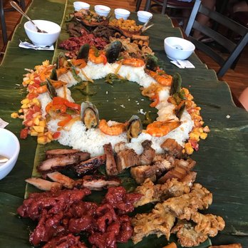 Kabayan - Nicely laid out feast fit for a king.  I've got my eye on the Chicharon Bulaklak and Lumpiang Prito!! - Filipino Near Me - Woodside, New York