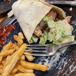 Abington Ale House - A warm flour tortilla stuffed with fried chicken tenderloins, hickory smoked bacon, sliced tomatoes, lettuce and honey mustard
