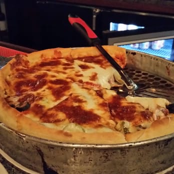 Exchequer Restaurant & Pub - Awesome! Half pepperoni / half black olive and jalapeño. - Pizza Near Me - Chicago, Illinois