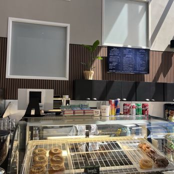 Roast N Grindz - Pastries and drinks. With the drink menu in the background - Coffee & Tea Near Me - Arden-Arcade, California Roast N Grindz - Pastries and drinks. With the drink menu in the background - Coffee & Tea Near Me - Arden-Arcade, California