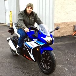 This is me on my 2019 Suzuki GSX250r right outside State 8's service department.