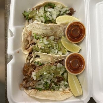 Giliberto's Mexican Taco Shop - Three carnitas tacos with flour tortillas (instead of corn tortillas) with red hot sauce. - Mexican Near Me - Rochester, Minnesota
