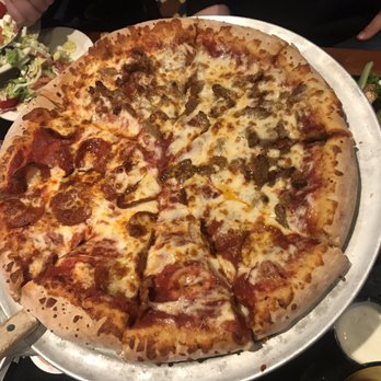 Pizza House - It looks an awful lot like pizza, doesn't it? Unfortunately, the crust, sauce, and toppings are bland and uninspired. - Pizza Near Me - Ann Arbor, Michigan