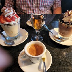Trattoria Vivolo - L-Best dessert pf my life! Cannoli cream, biscotti, strawberries, whip R-Coco hazelnut mousse baci candies.
