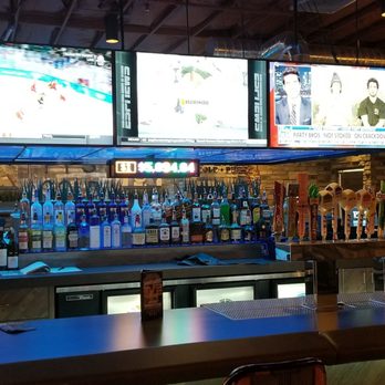 PT's Gold - Bar area fully stocked with blue lighting and flat screen views. Pretty cool! - Sports Bars Near Me - Las Vegas, Nevada