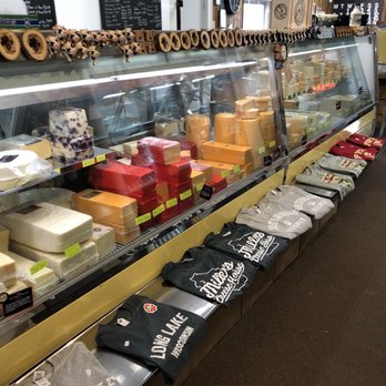 Miller's Cheese House - a display of cheeses - Cheese Shops Near Me - Rice Lake, Wisconsin Miller's Cheese House - a display of cheeses - Cheese Shops Near Me - Rice Lake, Wisconsin