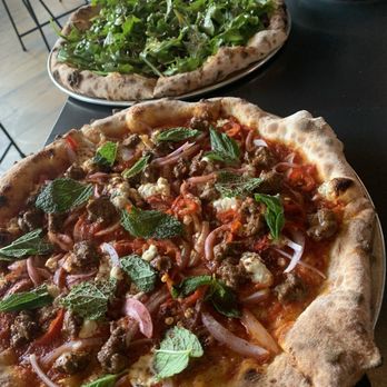 Young Joni - The pizza with the arugula is Korean BBQ Pizza! Can't remember the name of sausage pizza. - Pizza Near Me - Minneapolis, Minnesota