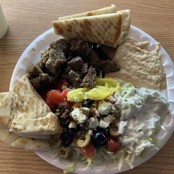 Taza Grill - a plate of food on a table - Mediterranean Near Me - Wake Forest, North Carolina Taza Grill - a plate of food on a table - Mediterranean Near Me - Wake Forest, North Carolina
