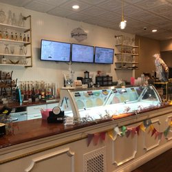 The Sugar Exchange - A view of the ice cream cases.  You can see the menu boards and to the upper left, some of the soda flavors.