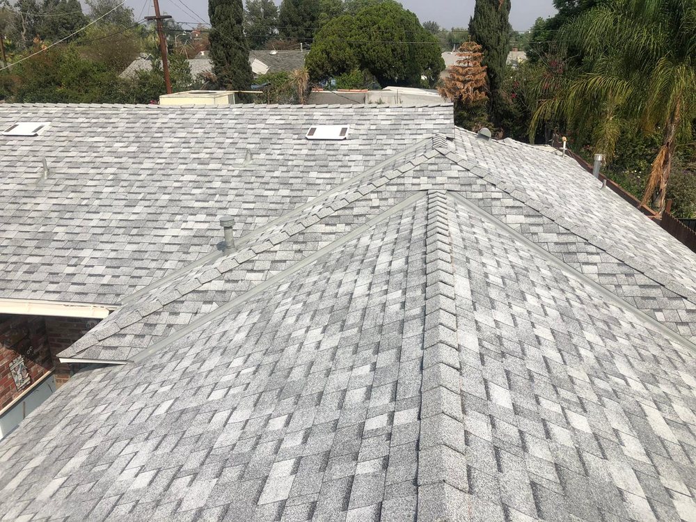 Slide of All American Construction and Roofing