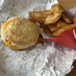 Wendy's - Breakfast - bacon egg cheese biscuit and large potatoes