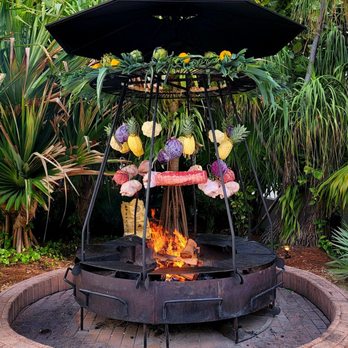 Veranda - Lunch meat with fruits and veggies hanging above the fire. - Breakfast & Brunch Near Me - Miami Beach, Florida
