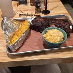 Jim 'N Nick's Bar-B-Q - 1/2 rack of babyback ribs with mac-n-cheese and corn on the cob.