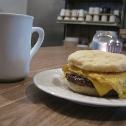 Miss Anita's Coffee Shoppe - Sausage pattie, scrambled egg & cheese on the softest, made-from-scratch, baking-soda biscuits!