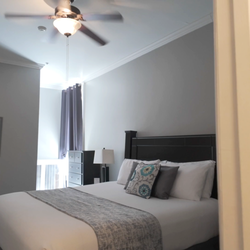 The Continental Hotel - Peek into one of our King bedrooms. Not shown: the beautiful view of our charming town square.