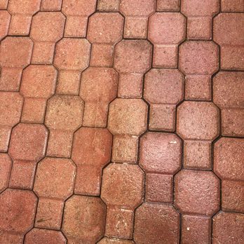 Pancho El Nica - a close up of a brick floor - Landscaping Near Me Pancho El Nica - a close up of a brick floor - Landscaping Near Me