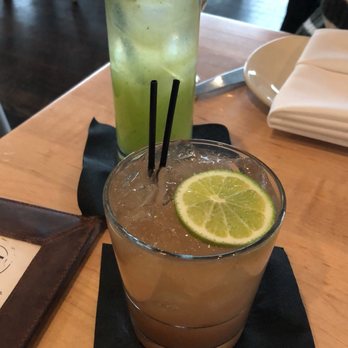 AMBAR Restaurant, Clarendon - Painkiller and apple collins(in the back) - Modern European Near Me - Arlington, Virginia